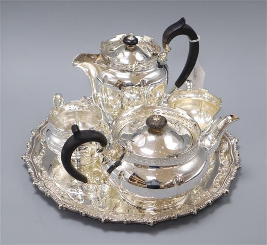 A four piece plated tea set and a salver